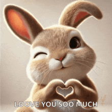 a rabbit is making a heart shape with its hands and says " loove you soo much "