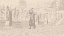 a man holding a sword in front of a building