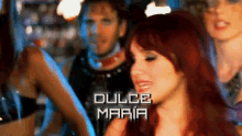 a woman with red hair and the name dulce maria on the bottom