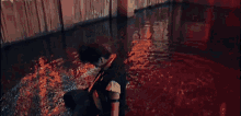 a person is swimming in a bloody pool of water .