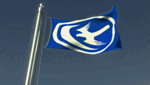 a blue and white flag with a bird in the middle