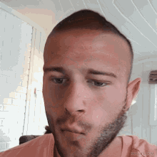 a close up of a man 's face with the website muglife.com in the bottom right corner