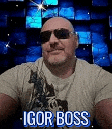 a man wearing sunglasses and a t-shirt with the name igor boss on it .