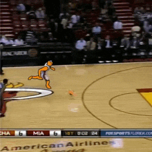 a basketball game is being played on a court sponsored by american airlines and fox sports florida.com