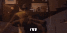 a blurry picture of a group of people dancing with the words yeet !