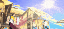 a group of people standing in front of a thatched house