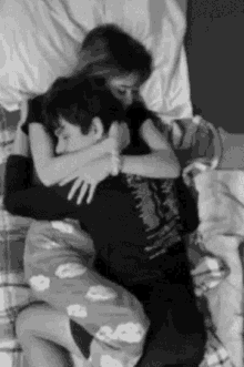 couple cute cuddle wrapped up bw