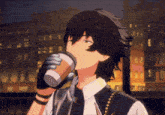 a man with black hair drinking from a cup