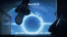 a person is standing in front of a computer screen with a black hole in the middle of the screen .