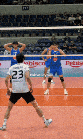 a volleyball player with the number 23 on his back