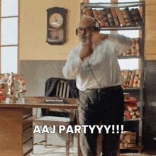 a man wearing headphones says aaj partyyy !!