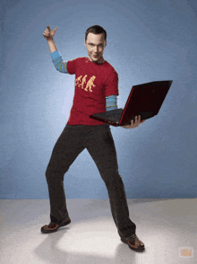 a man wearing a red shirt that says ' evolution ' on it