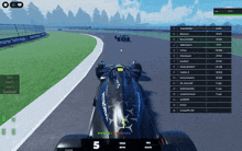 a screenshot of a video game showing a race car with the number 5 on it