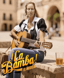 a woman sits on a stone wall playing a guitar with the words la bamba el musical written on the bottom