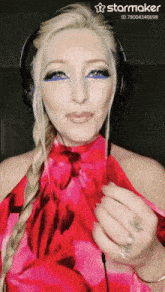 a woman wearing headphones has a starmaker id of 78004340688