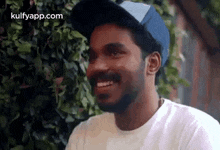 Smirking.Gif GIF - Smirking Kaanathe Music Video Vineeth Sreenivasan GIFs