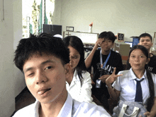 a boy with a lanyard around his neck that says ' i 'm a ' on it