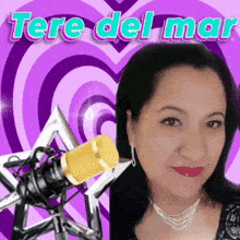 a woman stands in front of a microphone with the name tere del mar written on the top