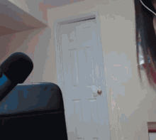 a microphone is sitting in front of a door