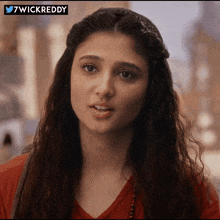 a close up of a woman 's face with the hashtag 7wickreddy