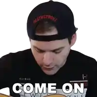 a man wearing a hat that says deathstroke is saying come on