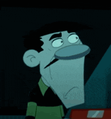 a cartoon character is making a funny face in the dark