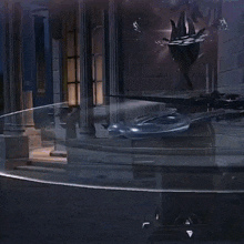 a person is spinning a hula hoop on a brick floor .