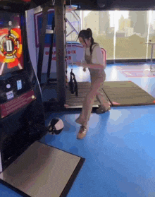a woman playing a video game with the number 11 on it