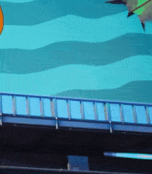 a bridge with a blue railing and a painting of a fish