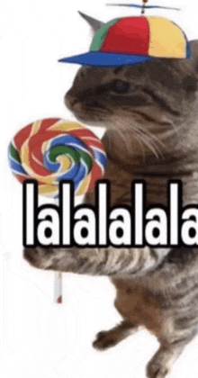 a cat wearing a hat is holding a lollipop with the words lalalalala written on it