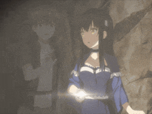 a girl in a blue dress is holding a flashlight while standing next to a boy