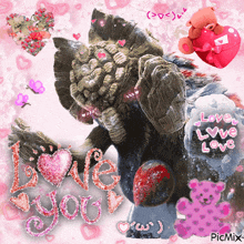 a picture of a monster surrounded by hearts and the words love you