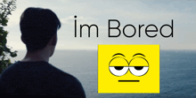 a man is looking at the ocean with the words im bored above him