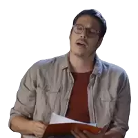 a man wearing glasses is holding a piece of paper