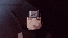 a close up of a person wearing a headband with the letter g