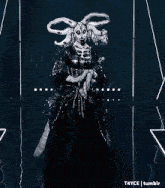 a black and white photo of a woman in a costume with the words t4yce tumblr on the bottom right