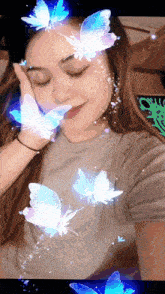 a woman with blue butterflies on her face
