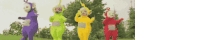 a group of teletubbies are standing next to each other in a field