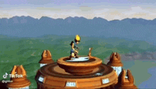 a cartoon character is standing on top of a circular platform in a video game .