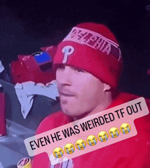 a man wearing a red hat with the letter p on it says even he was weirded tf out