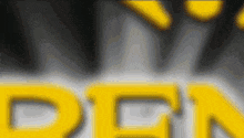 a close up of a yellow sign that says open on a black background .