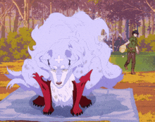 a man in a green shirt is standing next to a large white and red animal