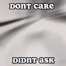 a picture of a white cloth with the words dont care didnt ask written on it