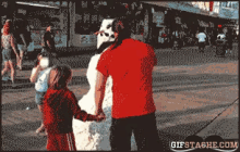 Best People Gifs Pictures GIF - Snowman Punch Prank GIFs