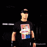 a man wearing a t-shirt that says john cena
