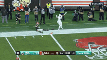 a football game between the miami dolphins and the cleveland browns is being shown on cbs