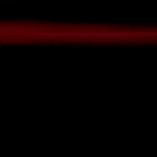 a person is flying through the air in a red light
