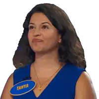 a woman in a blue shirt has a name tag that says tanya
