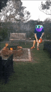 a man wearing sunglasses is standing in front of a fire pit holding a can of gas