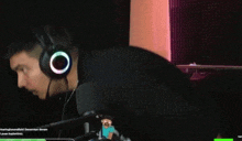 a man wearing headphones with a glowing ring around his head